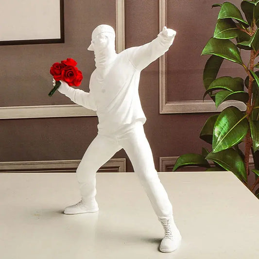 Rebel in Bloom – Banksy-Inspired Flower Bomber Resin Figurine Kwirko
