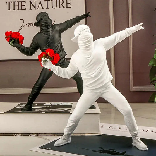 Rebel in Bloom – Banksy-Inspired Flower Bomber Resin Figurine Kwirko